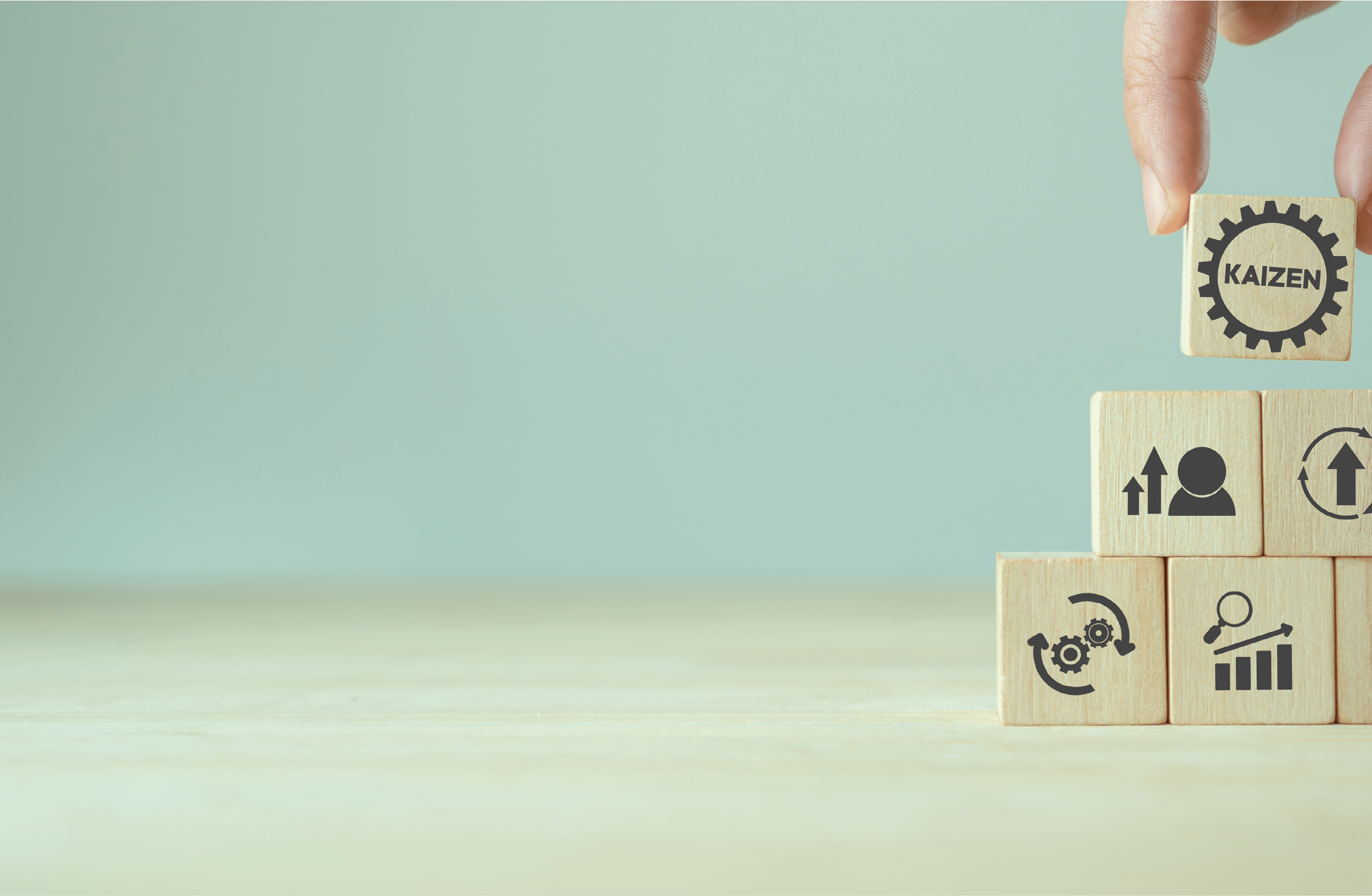 Kaizen concept; the continuous improvement in business for efficiency and effectiveness. Kaizen cycle icon on wood cubes; improve, continuous, process, result, standard solution. Quality improvement. 