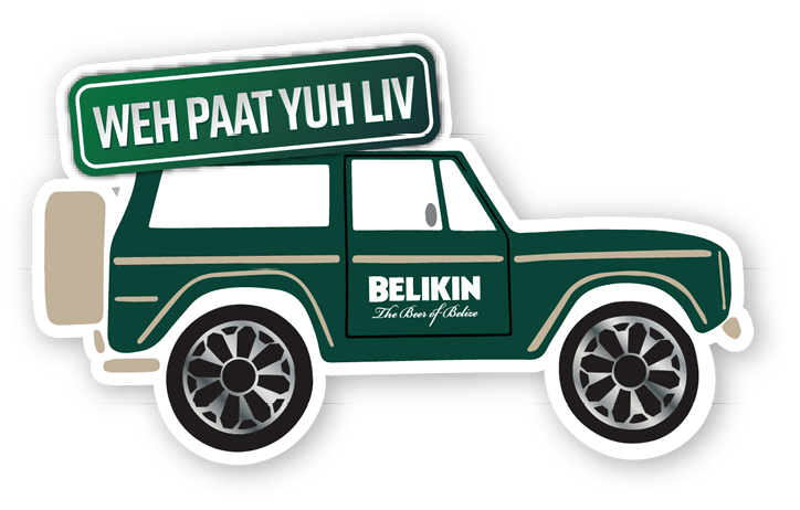 A green truck with a sign on the back that says “Weh Paat Yuhh Liv". Description generated by AI